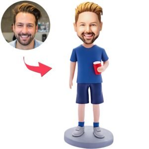 man holding glass bobblehead
