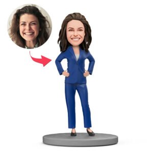 female boss bobblehead india in blue suit with crossed arms and engraved text