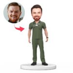 Custom male doctor bobblehead India in green scrubs with engraved name tag