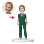 Custom female doctor bobblehead India in green scrubs with engraved National Doctors Day text