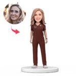 Custom female doctor bobblehead India in red scrubs with engraved Doctors Day text
