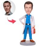 male doctor bobblehead india with first aid kit and custom engraved text base